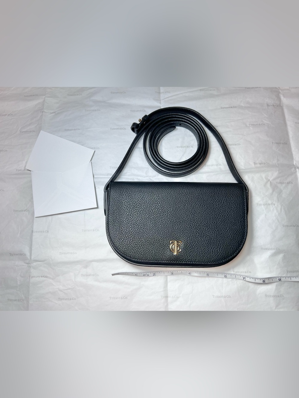 Tiffany & Co. Black Leather Crossbody bag with Gold plated Logo